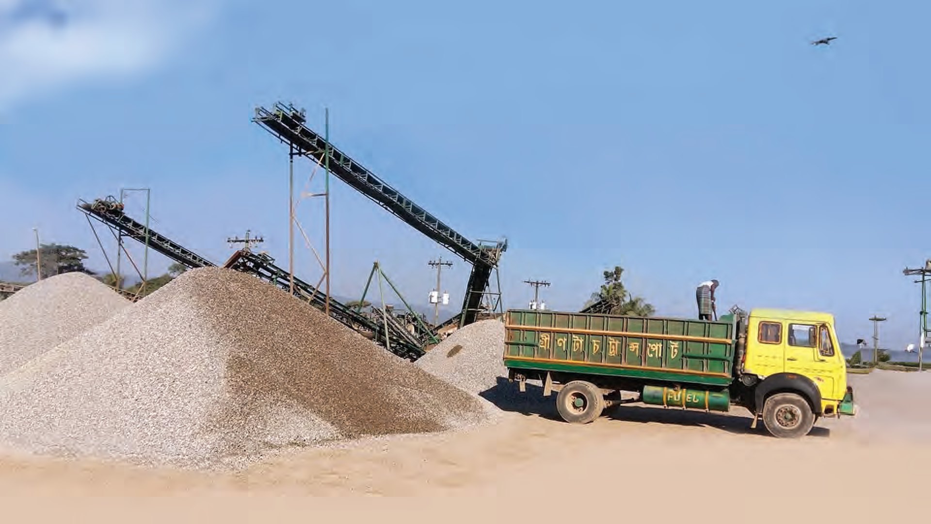 A Greentouch Transport tipper truck hauling aggregate.
